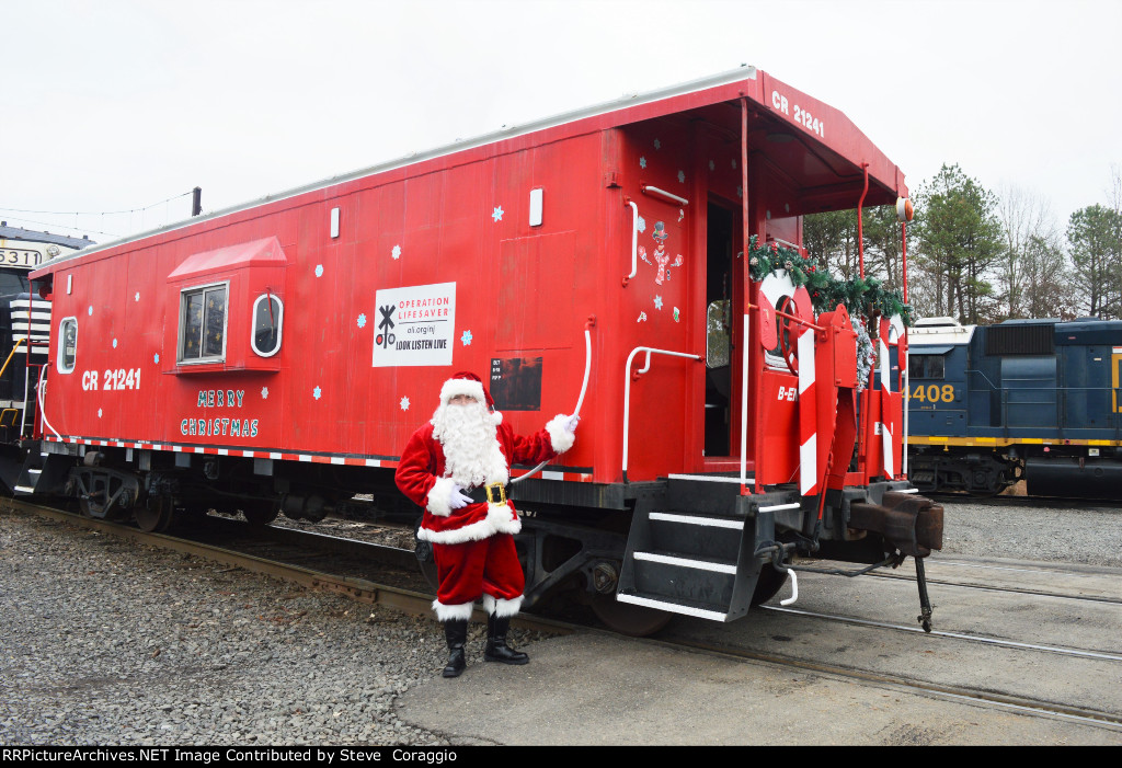 Santa Next to his Rail Sleigh